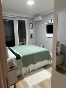Ap Cozy Calhau prox PRAIA客房内的一张或多张床位