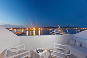 a view from a balcony of a harbor with boats at Ryans La Marina in Ibiza Town