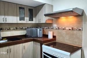 Η κουζίνα ή μικρή κουζίνα στο Mini Departamento Acogedor