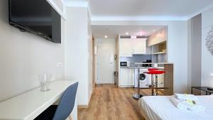 Kuchyň nebo kuchyňský kout v ubytování Hotel Le Florian