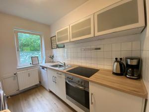 Kuchyň nebo kuchyňský kout v ubytování Zentrale 3-Zimmer Wohnung mit Balkon - Perfekt für Monteure und Familien