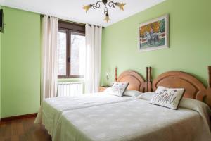Postel nebo postele na pokoji v ubytování Hotel Rural Rio Viejo + 39 fotografií
