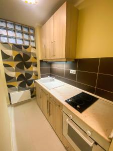Η κουζίνα ή μικρή κουζίνα στο Fresh smartly designed Studio Flat & sunny balcony