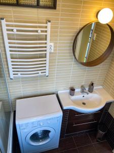 Et badeværelse på Fresh smartly designed Studio Flat & sunny balcony