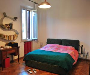 A bed or beds in a room at La Casa di Marina