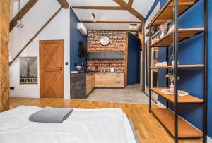 Posteľ alebo postele v izbe v ubytovaní Przytulny Apartament Z Wieżą