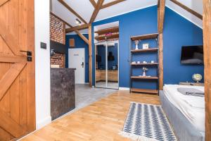 Posteľ alebo postele v izbe v ubytovaní Przytulny Apartament Z Wieżą