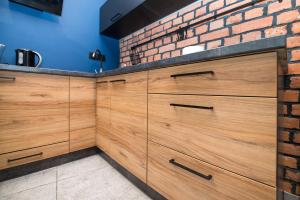 Kuchyňa alebo kuchynka v ubytovaní Przytulny Apartament Z Wieżą