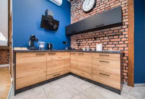 Kuchyňa alebo kuchynka v ubytovaní Przytulny Apartament Z Wieżą