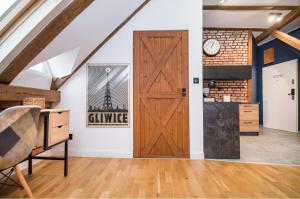 Kuchyňa alebo kuchynka v ubytovaní Przytulny Apartament Z Wieżą