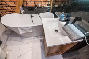 Kúpeľňa v ubytovaní Przytulny Apartament Z Wieżą