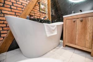 Kúpeľňa v ubytovaní Przytulny Apartament Z Wieżą