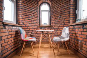 Posedenie v ubytovaní Przytulny Apartament Z Wieżą