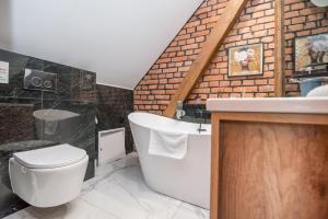 Kúpeľňa v ubytovaní Przytulny Apartament Z Wieżą