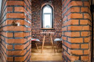 Posedenie v ubytovaní Przytulny Apartament Z Wieżą
