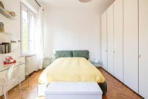 A bed or beds in a room at La Casa di Marina