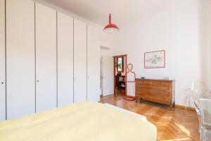 A bed or beds in a room at La Casa di Marina