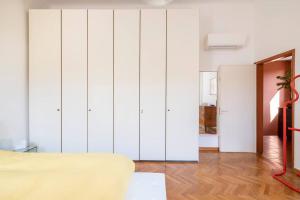 A bed or beds in a room at La Casa di Marina