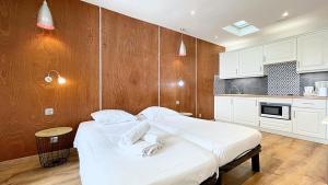 Kuchyň nebo kuchyňský kout v ubytování Hotel Le Florian