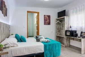 En eller flere senge i et værelse på Villa Mamba + 21 billeder