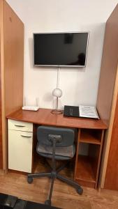 Μια τηλεόραση ή/και κέντρο ψυχαγωγίας στο Cozy flat near the city center