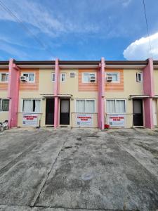 an empty parking lot in front of a building at Calapan City Guest House Transient in a Subdivision near Malls L41 in Calapan