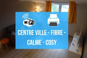 a blue sign that says the wfc centre valley flfire calline cosy at Nuit étoilée in Béthune
