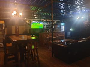 Lounge nebo bar v ubytování Rosa Negra Uganda