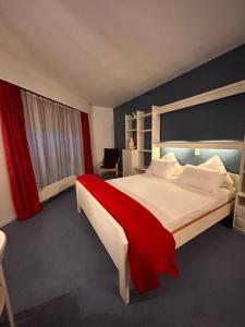 Postel nebo postele na pokoji v ubytování Hôtel EDIROL