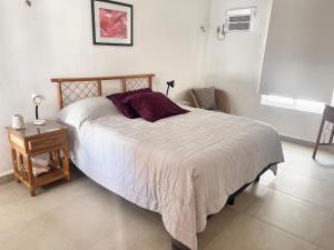 Postel nebo postele na pokoji v ubytování Departamento Medina + 21 fotografií