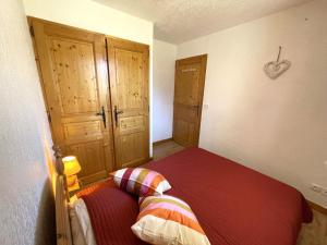 Katil atau katil-katil dalam bilik di Appartement Les Menuires, 2 pièces, 4 personnes - FR-1-452-73