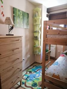 Postel nebo postele na pokoji v ubytování Acogedor apartamento dúplex Sandiniés