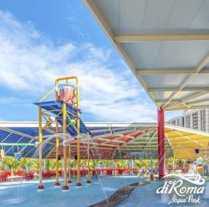 a playground at a water park with a basketball hoop at Spazzio Diroma - Hospedagem com Acqua Park (Parque do Vulcão) in Caldas Novas