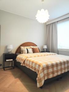 Postel nebo postele na pokoji v ubytování Näsinkulma Aprt with Sauna, Free 5G Wifi, Downtown