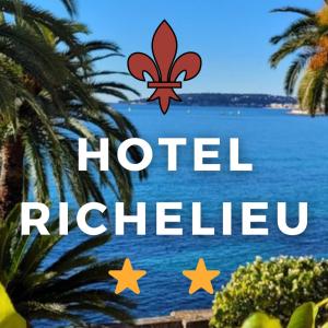 a sign for a hotel near the water with stars at H&ocirc;tel Richelieu in Menton