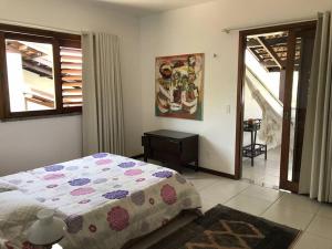 Ένα ή περισσότερα κρεβάτια σε δωμάτιο στο Casa em condomínio fechado na Serra Guaramiranga