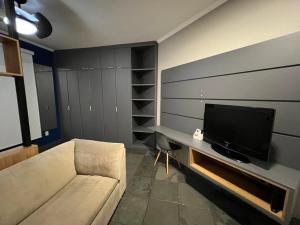 Et tv og/eller underholdning på Flat á Beira-mar no Itararé em SV.