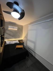 En eller flere senge i et værelse på Flat á Beira-mar no Itararé em SV. + 52 billeder