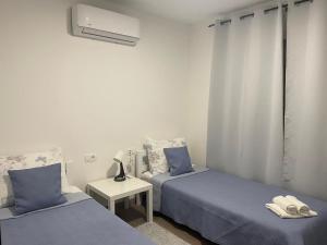 Postel nebo postele na pokoji v ubytování Apartman Family Čović