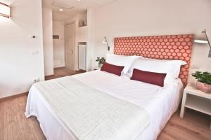 Postel nebo postele na pokoji v ubytování Poggio Baronti B&B