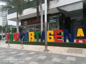 a large sign in front of a store at Apartahotel Cartagena in Cartagena de Indias