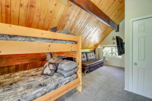 a bedroom with two bunk beds in a cabin at Less Than 2 Mi to Dtwn Prescott Cabin with Furnished Deck in Prescott
