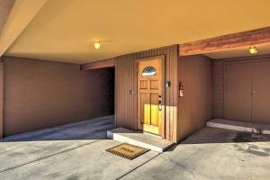 a front door of a house with a garage at Steps to Diamond Peak Incline Village Condo in Incline Village
