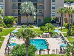 an aerial view of the pool at the resort at Pet-friendly 2-bed Condo With Amazing Waterfront Views in Clearwater Beach
