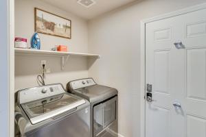a small laundry room with a washer and dryer at Private Patio and Fire Pit at Gold Canyon Getaway! in Gold Canyon +20 photos