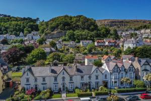an aerial view of a town with houses at Abbey Lodge in Llandudno