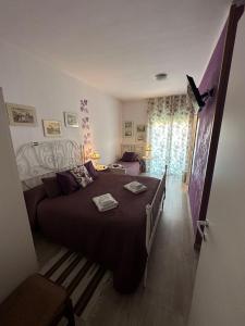 Posteľ alebo postele v izbe v ubytovaní B&B San Vitale