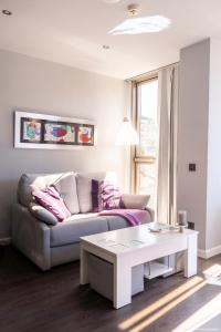A seating area at Apartamento - Riba De Sella