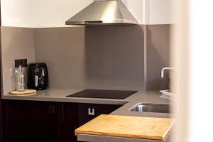 A kitchen or kitchenette at Apartamento - Riba De Sella