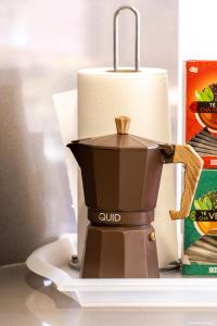 Coffee and tea making facilities at Apartamento - Riba De Sella
